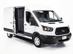 Outside view of the ford transit prision transport vehicle, side door opened to show secure door